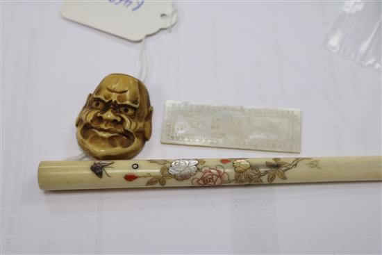 A Shibayama style cheroot holder, a Japanese ivory manju netsuke and a mother of pearl token